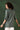 Tempting Rayon Fabric Olive Green Color Short Kurti With Embroidered Work