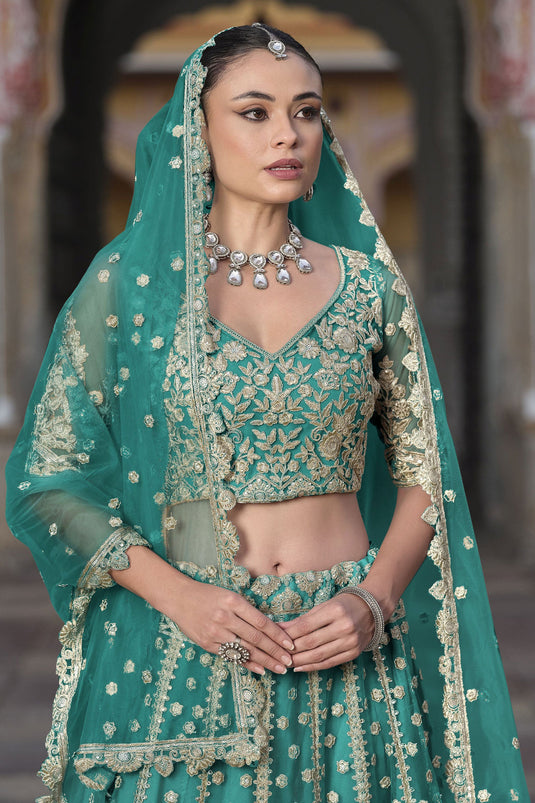 Net Sangeet Wear Lehenga Choli In Sea Green Color