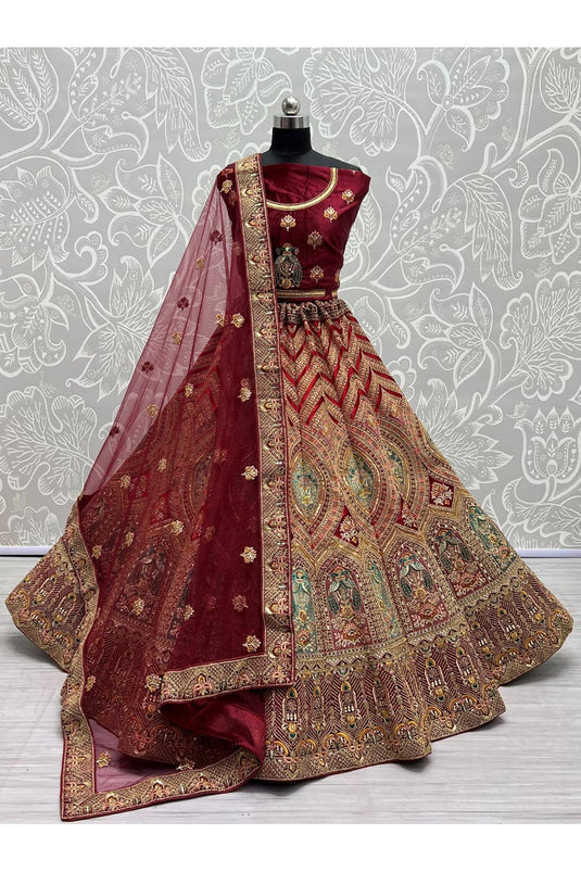 Engaging Maroon Color Silk Fabric Embroidered Work Wedding Wear Bridal Lehenga