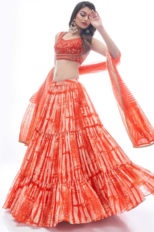 Embellished Thread Embroidered Work On Rust Color Function Wear Lehenga In Jacquard Fabric