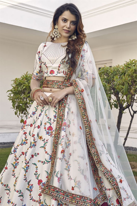 Elegant Art Silk Fabric With Embroidered Work Off White Color Lehenga