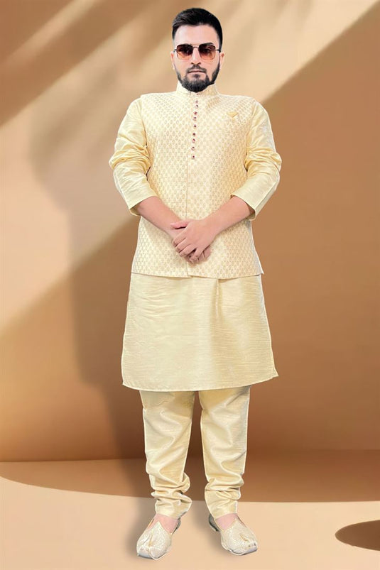 Intriguing Function Wear Cream Kurta Pyjama With Golden Color Jacket In Silk Fabric