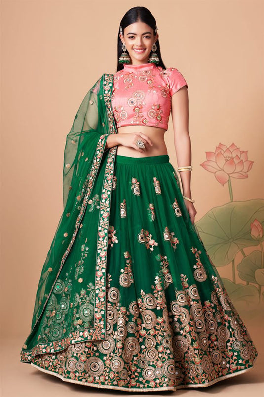 Entrancing Net Fabric Sangeet Wear Lehenga Choli In Green Color