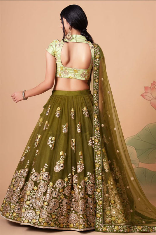 Engaging Mehendi Green Color Net Fabric Lehenga Choli In Sangeet Wear