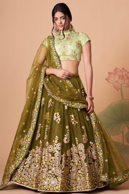 Engaging Mehendi Green Color Net Fabric Lehenga Choli In Sangeet Wear