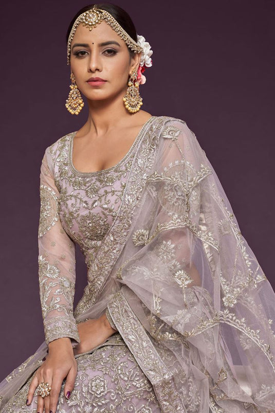 Embroidered Work On Cream Color Gorgeous Lehenga In Net Fabric