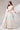 Occasion Wear Sequins Work Lehenga Choli In Cream Color Net Fabric