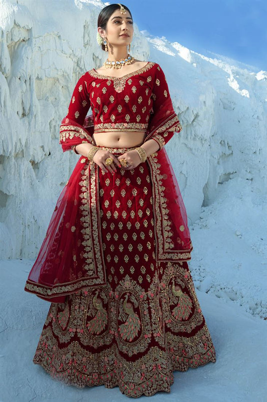 Wedding Wear Embroidered Maroon Color Exquisite Lehenga In Velvet Fabric