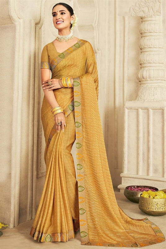 Chiffon Fabric Mustard Color Riveting Foil Printed Saree