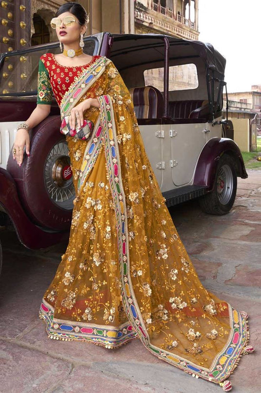 Mustard Color Net Fabric Sequins Work On Fantastic Saree