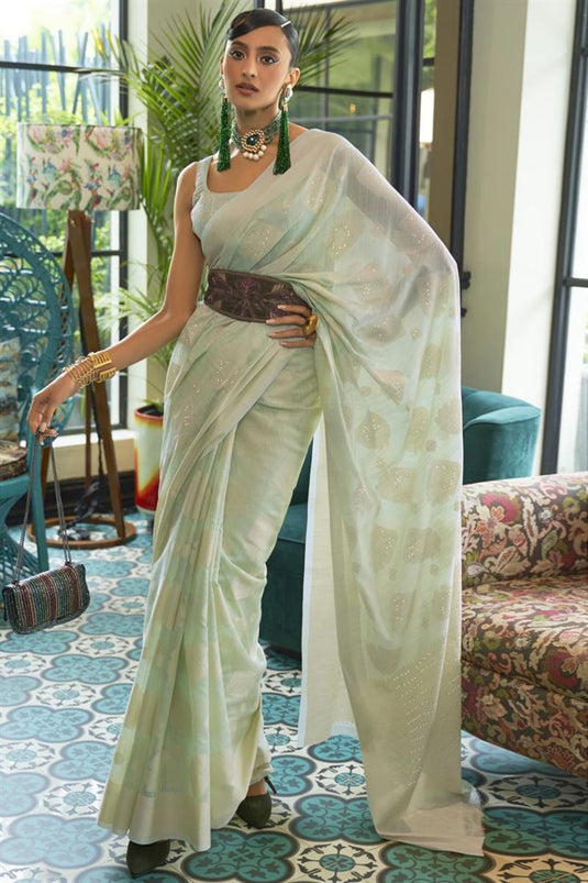 Riveting Art Silk Lucknowi Chikankari Work Saree In Sea Green Color