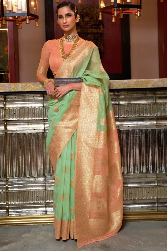 Sea Green Color Linen Fabric Ravishing Party Look Saree