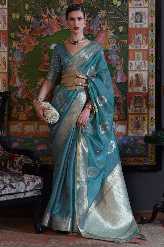 Wonderful Handloom Weaving Teal Color Saree In Organza Fabric