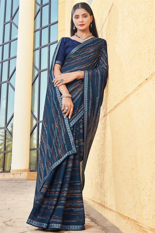 Winsome Georgette Blue Color Casual Look Printed Saree