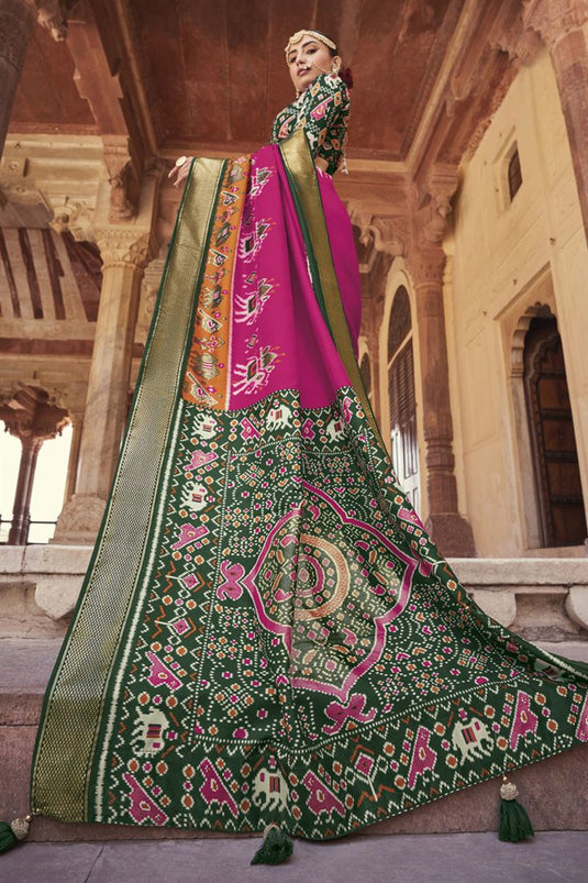 Attractive Patola Silk Rani Color Printed Saree