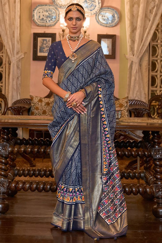 Classy Patola Silk Saree In Navy Blue Color with Ethnic Print