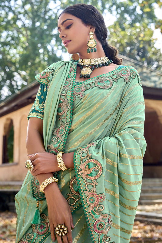 Incredible Silk Sea Green Color Saree With Heavy Embroidered Blouse