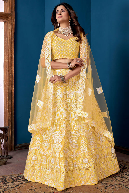 Embroidered Yellow Color Lehenga Choli In Net Fabric