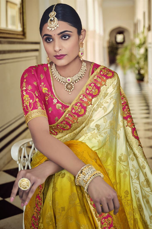 Banarasi Fabric Attrective Yellow Color Wedding Wear Saree With Weaving Work