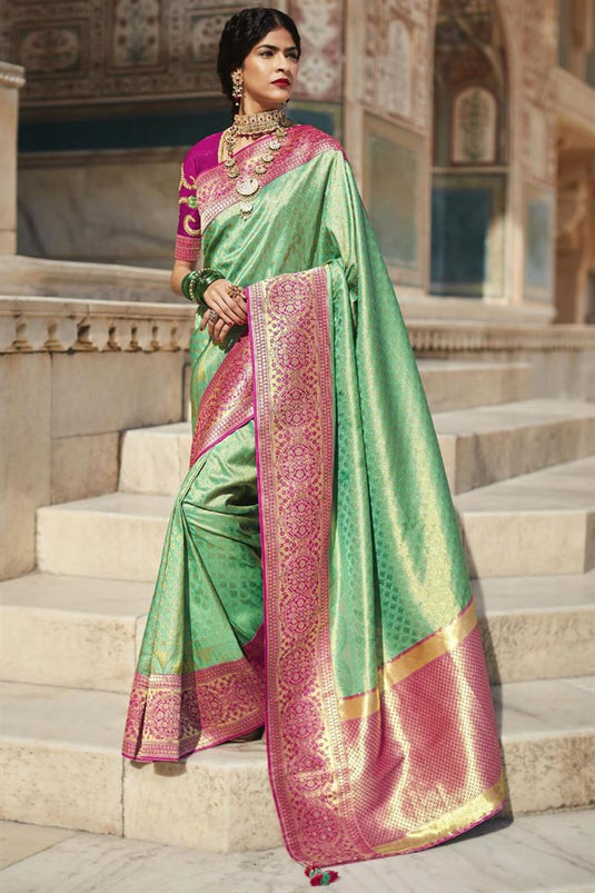 Art Silk Fabric Green Color Weaving Work Phenomenal Saree In Function Wear