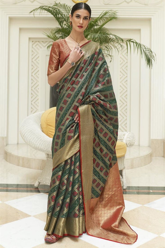 Green Color Patola Silk Fabric Attractive Festive Wear Saree