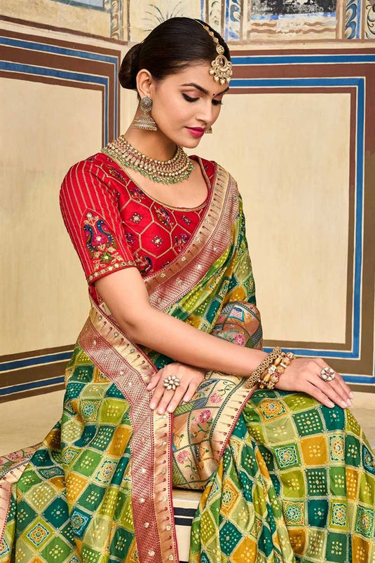 Radiant Wedding Wear Green Color Art Silk Fabric Saree