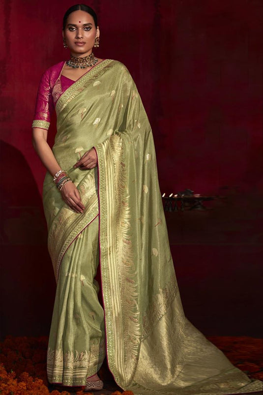 Fascinating Olive Color Art Silk Fabric Weaving Work Saree