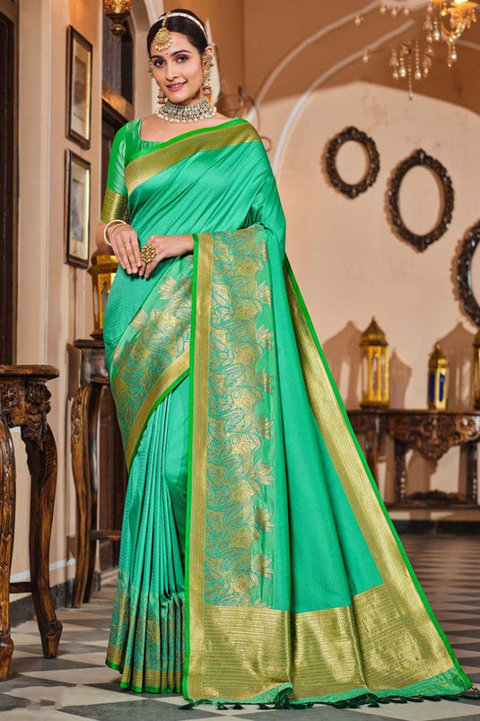 Engaging Green Color Silk Fabric Saree With Weaving Work