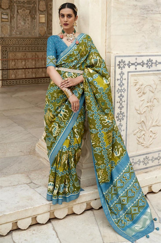 Art Silk Fabric Function Wear Patola Printed Luxurious Saree In Mehendi Green Color