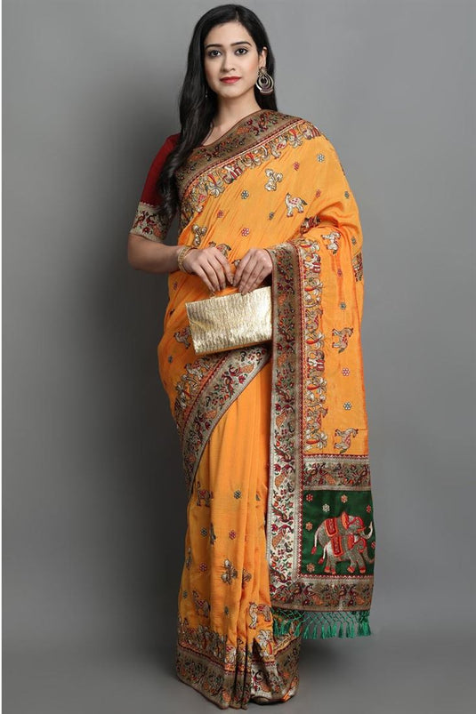 Festival Wear Art Silk Fabric Enticing Embroidered Work Patola Saree In Orange Color