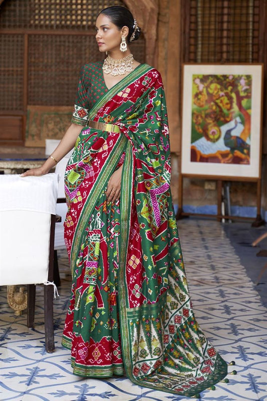 Art Silk Fabric Sparkling Dark Green Color Patola Printed Saree