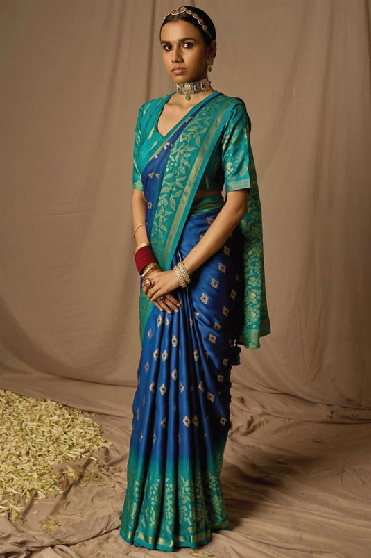 Soothing Weaving Work On Blue Color Brasso Fabric Saree