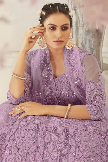 Creative Embroidered Work On Designer Lehenga In Lavender Color Net Fabric