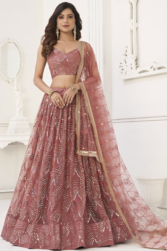 Embellished Peach Color Sangeet Wear Net Fabric Lehenga Choli