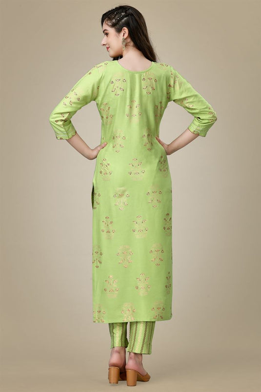 Radiant Green Color Rayon Fabric Kurti With Pant