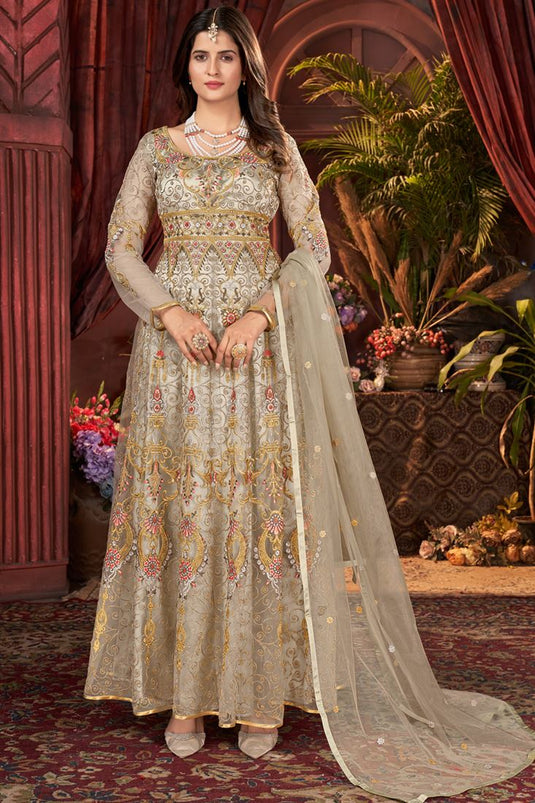 Komal Vora Net Fabric Beige Color Supreme Anarkali Suit For Function