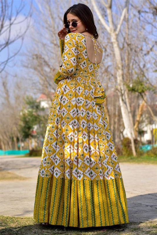 Fancy Fabric Party Wear Glamorous Printed Long Gown In Mustard Color