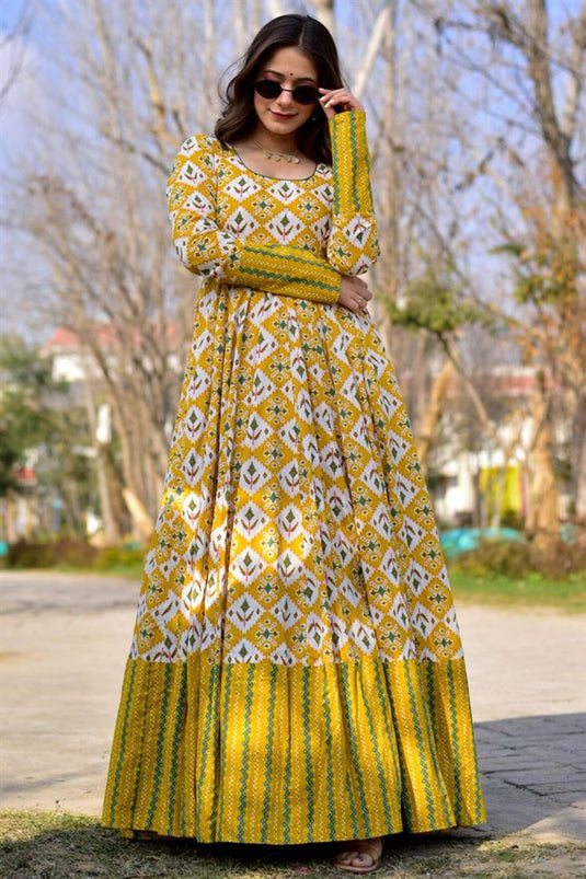 Fancy Fabric Party Wear Glamorous Printed Long Gown In Mustard Color