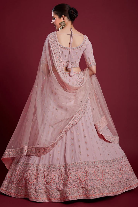 Vibrant Peach Color Georgette Lehenga with Embroidered and Zarkan Work