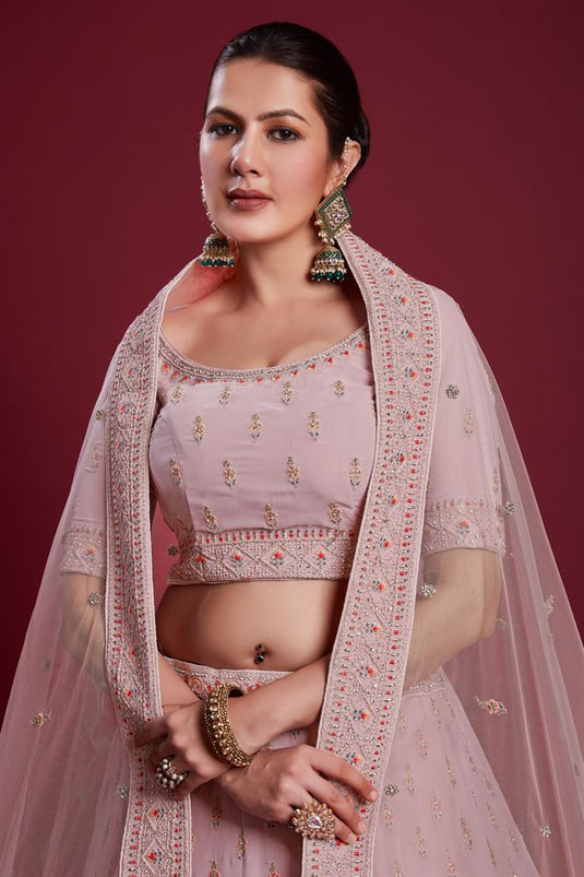 Vibrant Peach Color Georgette Lehenga with Embroidered and Zarkan Work