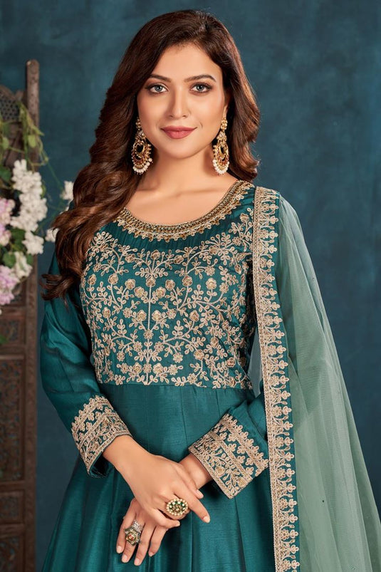 Sangeet Wear Art Sirk Fabric Teal Color Embroidered Anarkali Suit With Net Dupatta