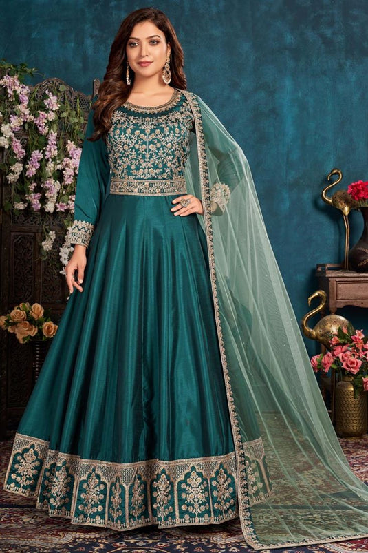 Sangeet Wear Art Sirk Fabric Teal Color Embroidered Anarkali Suit With Net Dupatta