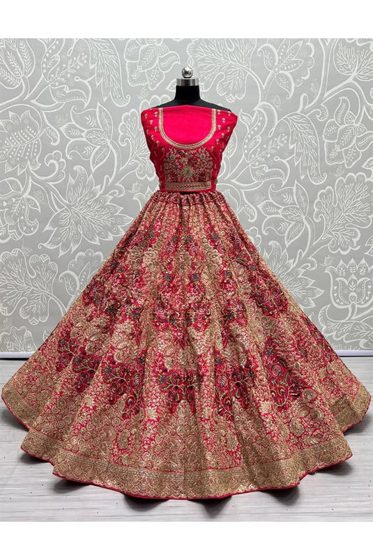 Luxurious Grand Wedding Bridal Embroidered Silk Fabric Lehenga in Rani Color